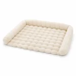 LowPurr Quilted Cream Floor Cat Bed for Large Stretching Cats white background product photo